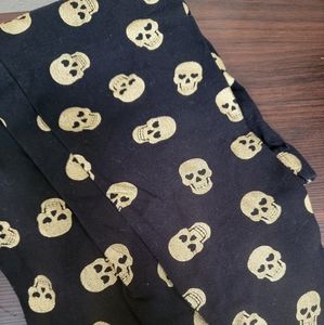 Black and gold skull leggings